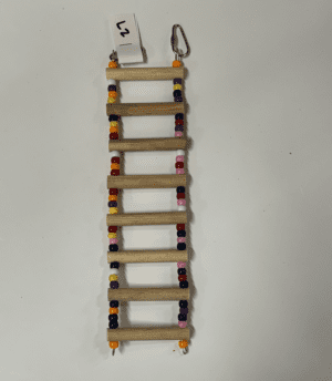A Small Ladder with colorful beads attached to it.